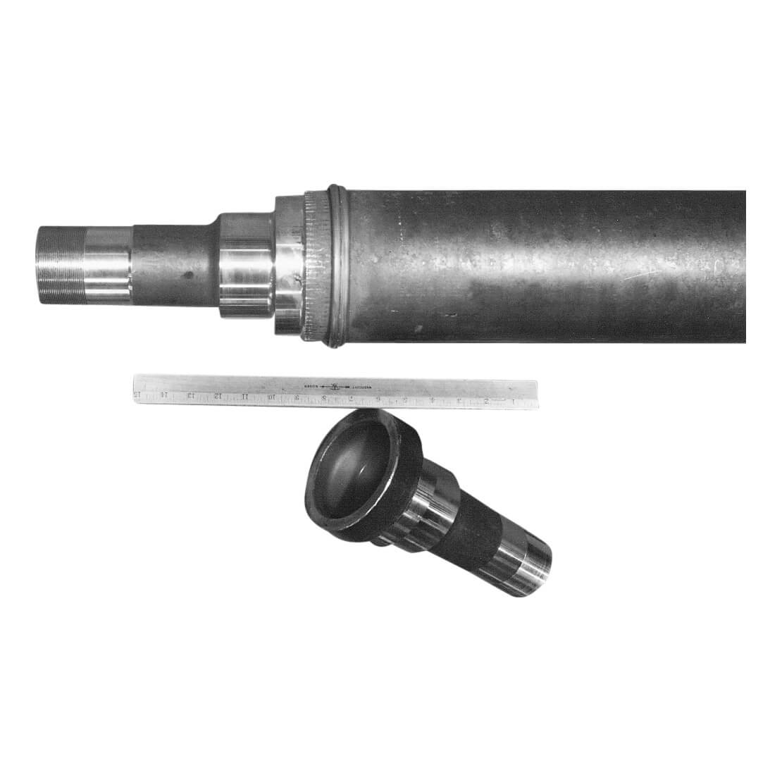 Forged wheel spindles joined to 5 inches (127 mm) diameter - 5 inches (12.7 mm) wall tubing to produce trailer axles.