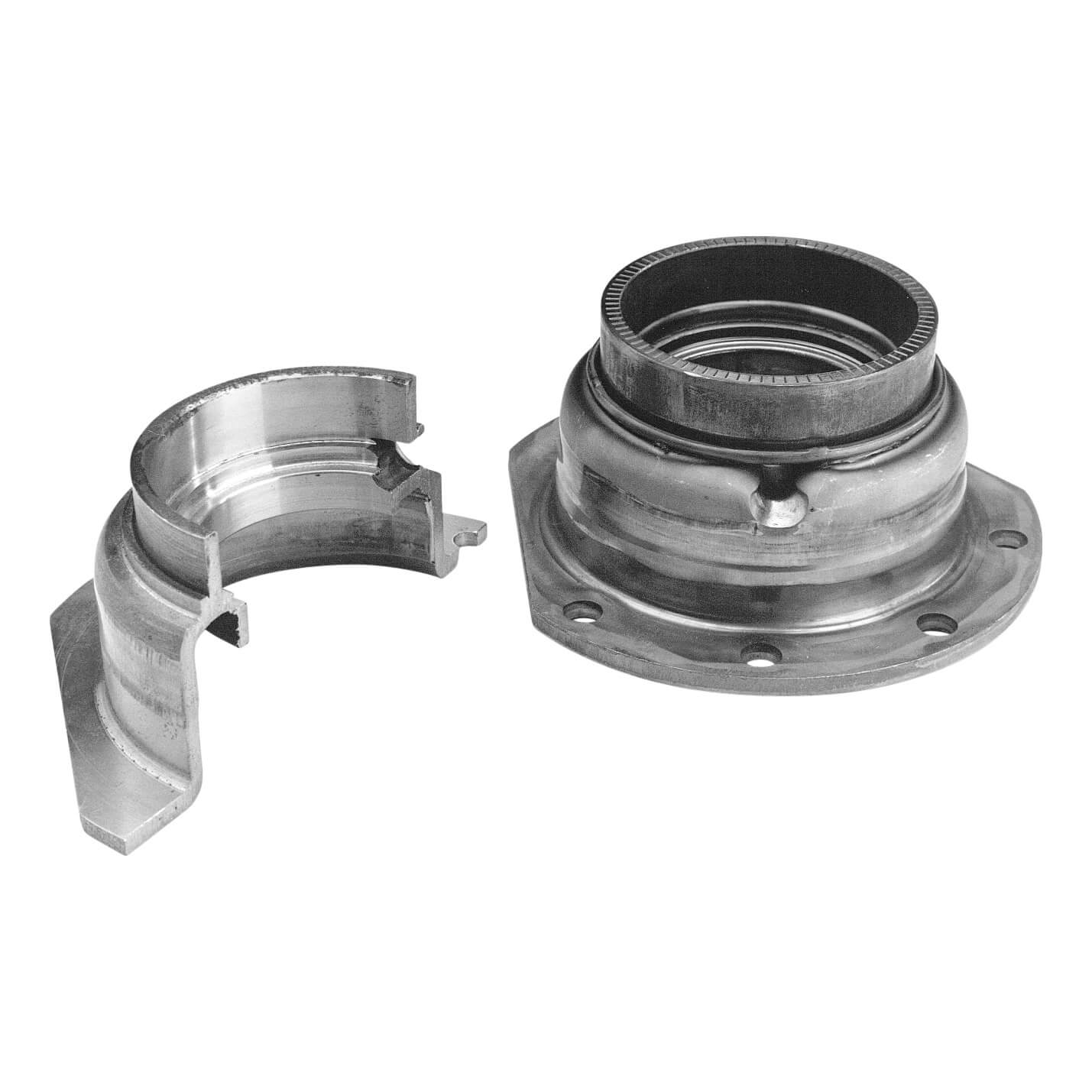 Retainer-differential bearing blank cross-section (left). Bearing housing retainer for transaxle (right).