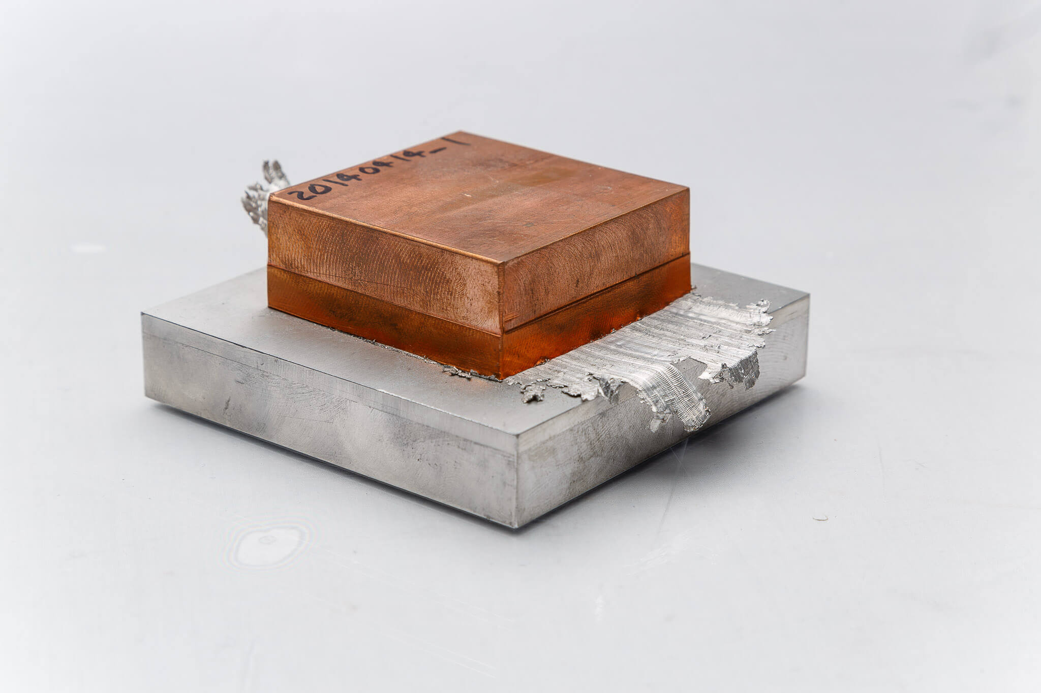 Bi-metallic application linear friction welding of copper alloy block to aluminum plate