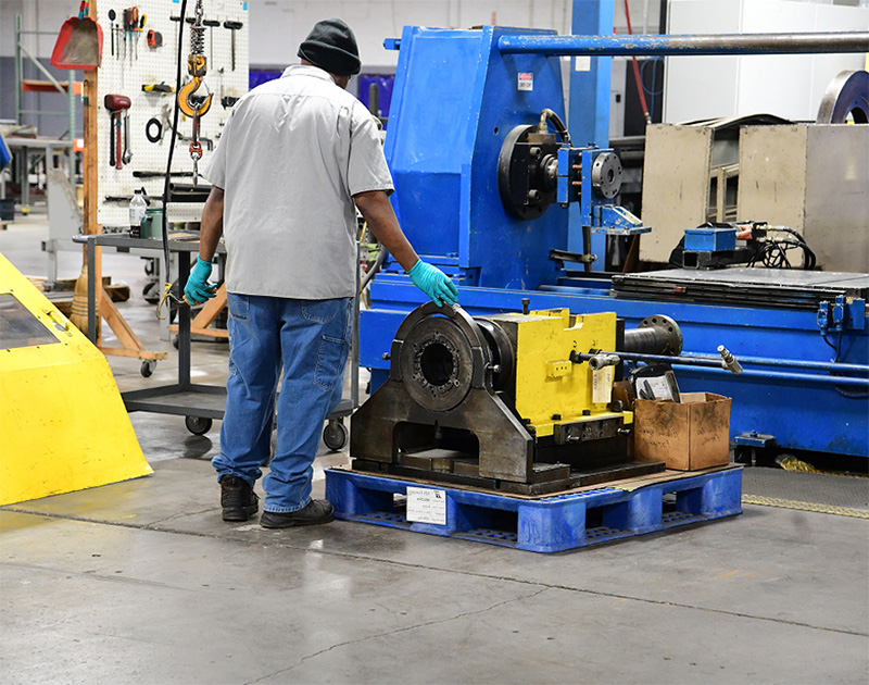mti employee working on tooling services and heat treatment